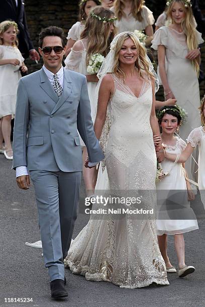 Jamie Hince and Kate Moss outside the church after their wedding on July 1, 2011 in Southrop, England.