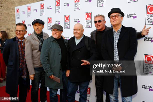 Dan Woodgate, Lee Thompson, Chris Foreman, Graham McPherson aka Suggs Mike Barson and Chas Smash from Madness attend the Q Awards 2019 at The...