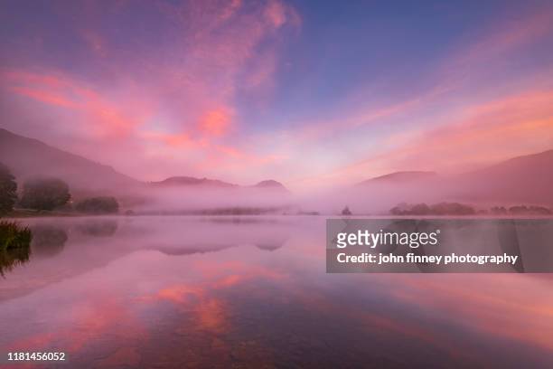 lake district - grasmere - lake - sunrise - mist - weather - uk - morning in the mountain stock pictures, royalty-free photos & images