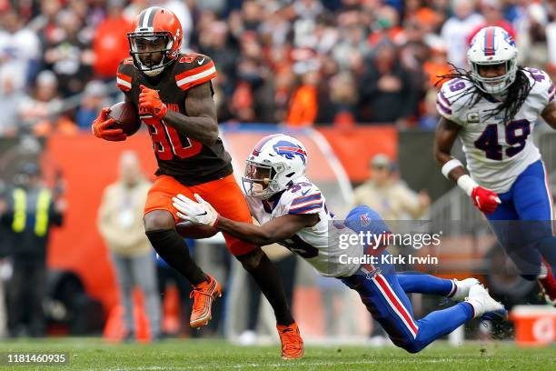 Jarvis Landry of the Cleveland Browns is tackled by Levi Wallace of the Buffalo Bills during the second quarter at FirstEnergy Stadium on November...