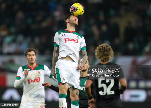 Fedor Smolov of FC Lokomotiv Moscow vie for the ball during the Russian Football League match between FC Lokomotiv Moscow and FC Krasnodar at RZD...