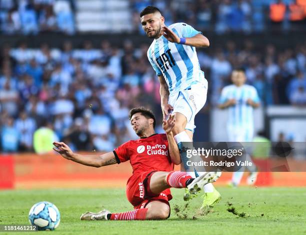 Mariano Bareriro of Huracan challenges David Barbona of Racing Club during a match between Racing Club and Huracan as part of Superliga 2019/20 at...