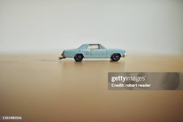 toy car on table - modellauto stock-fotos und bilder