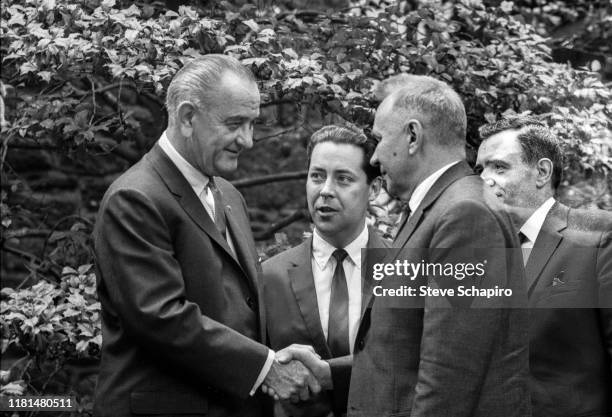 American President Lyndon Johnson and Soviet Premier Alexei Kosygin shake hands during the Glassboro Summit Conference, on the campus of Glassboro...