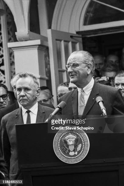American President Lyndon Johnson speaks at a lectern during the Glassboro Summit Conference, on the campus of Glassboro State College, Glassboro,...