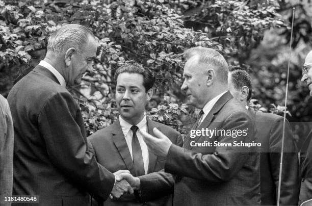 American President Lyndon Johnson and Soviet Premier Alexei Kosygin shake hands during the Glassboro Summit Conference, on the campus of Glassboro...