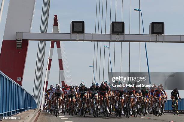 The peloton makes its way over a bridge towards St Nazaire during Stage 3 of the 2011 Tour de France from Olonne sur Mer to Redon on July 4, 2011 in...