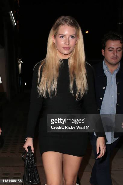 Nicola Hughes and Lottie Moss seen attending Apothem x Harvey Nichols - launch party on October 16, 2019 in London, England.