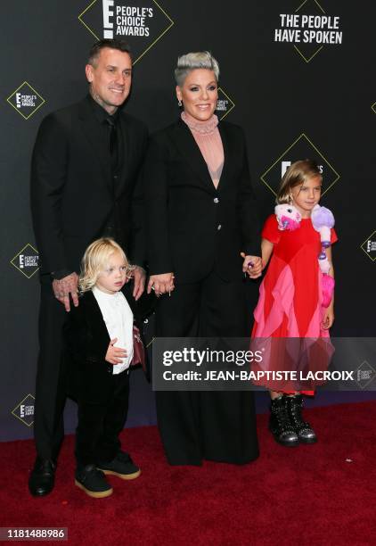 Singer/songwriter Pink arrives with her husband pro-motorcycle racer Carey Hart and their children Willow Sage Hart and Jameson Moon Hart for the...