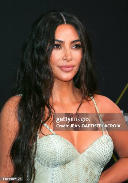 Business woman/media personality Kim Kardashian arrives for the 45th annual E! People's Choice Awards at Barker Hangar in Santa Monica, California,...