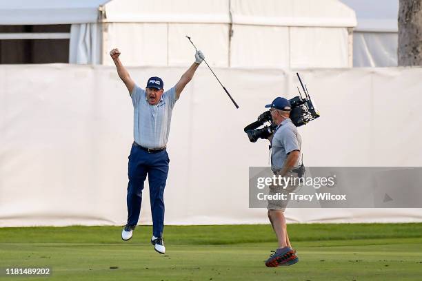 Jeff Maggert jumps in the air after he eagled out from the fairway during the final round of the PGA TOUR Champions Charles Schwab Cup Championship...