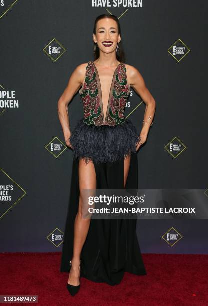 Actress Maggie Q arrives for the 45th annual E! People's Choice Awards at Barker Hangar in Santa Monica, California, on November 10, 2019.