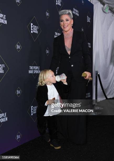 Singer/songwriter Pink and her son Jameson Moon Hart poses with the Peoples Champion Award during the 45th annual E! People's Choice Awards at Barker...