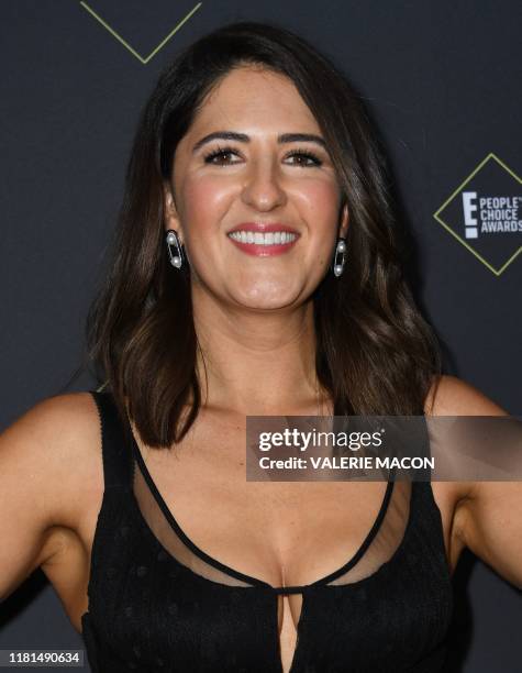 Actress D'Arcy Carden poses in the press room during the 45th annual E! People's Choice Awards at Barker Hangar in Santa Monica, California, on...