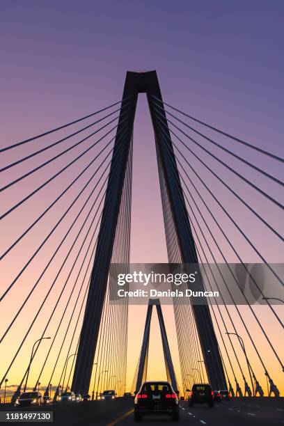 crossing the bridge at sunset - mount pleasant south carolina stock pictures, royalty-free photos & images