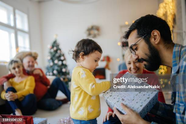 opening christmas presents - father gift stock pictures, royalty-free photos & images