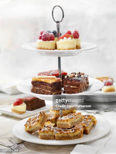 afternoon tea three tier stand of desserts - desserts stock pictures, royalty-free photos & images
