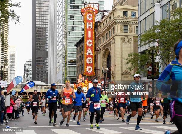 General view of competitors runing past the Chicago Theater during the 2019 Bank of America Chicago Marathon on October 13, 2019 in Chicago, Illinois.