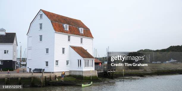 The Tide Mill living museum producing stoneground flour in a traditional clapboard timber house in Woodbridge in Suffolk, England, United Kingdom.