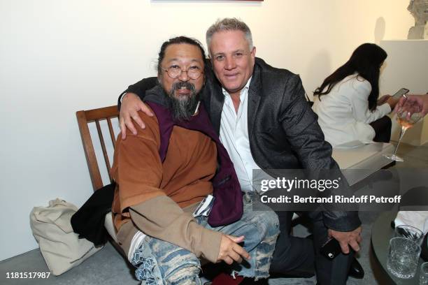 Artist Takashi Murakami and Francois Odermatt attend the Takashi Murakami "Baka" Exhibition Preview at Gallery Perrotin, as part of the FIAC 2019 -...