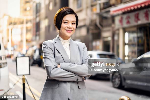 confident asian businesswoman - yongyuan hongkong stock pictures, royalty-free photos & images