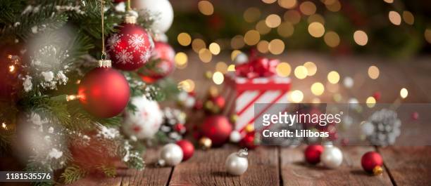 christmas red and white gift and ornaments background - gift background stock pictures, royalty-free photos & images