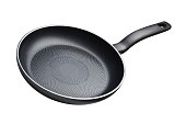 Black teflon skillet with non-stick coated surface isolated