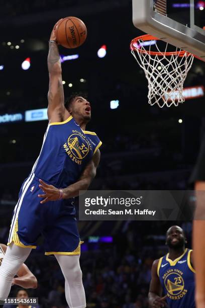 Marquese Chriss of the Golden State Warriors dunks the ball during the first half of a game against the Los Angeles Lakers at Staples Center on...