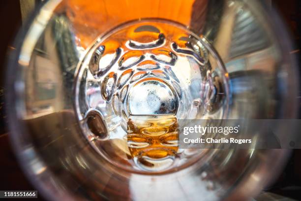 drinking a large glass of beer - beer glasses stock pictures, royalty-free photos & images