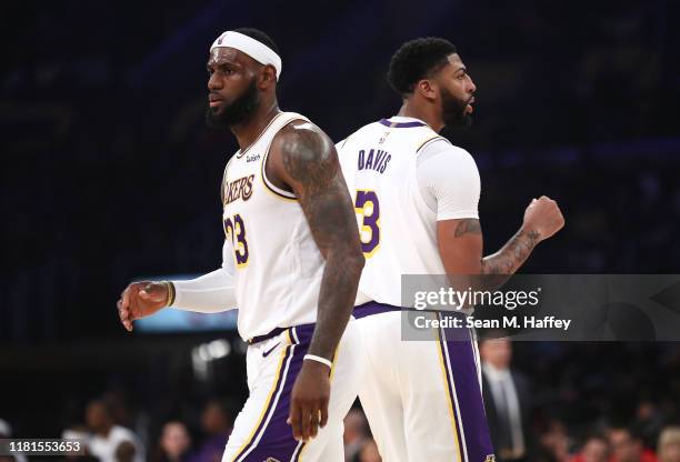 LeBron James and Anthony Davis of the Los Angeles Lakers look on during the second half of a game against the Golden State Warriors at Staples Center...