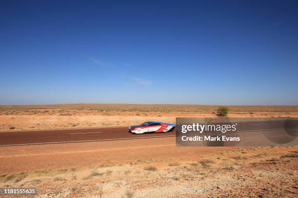 The IVE Engineering Solar Car Team car 'Sophie 6s' from Hong Kong competes in the Cruiser class on Day 5 of the 2019 Bridgestone World Solar...