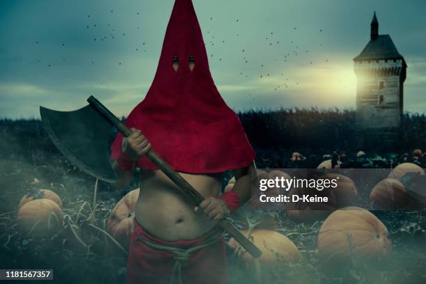 executioner with big axe - executioner stock pictures, royalty-free photos & images