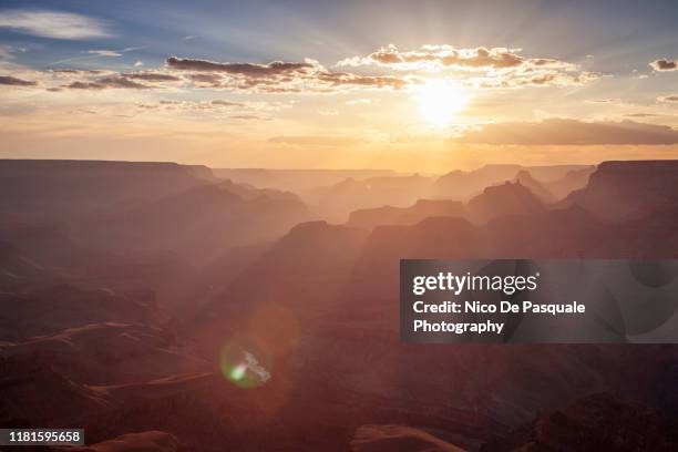 grand canyon - south rim - sun flare clouds sky stock pictures, royalty-free photos & images