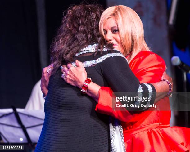 Singer Martha Reeves , recipient of the Casino Entertainment Legend Award, is greeted by singer/songwriter Claudette Rogers Robinson at at the Global...