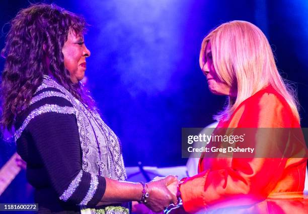 Singer Martha Reeves , recipient of the Casino Entertainment Legend Award, is greeted by singer/songwriter Claudette Rogers Robinson at at the Global...