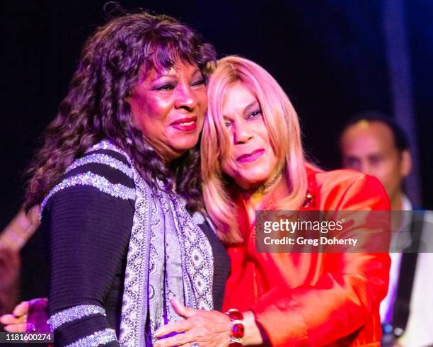 Singer Martha Reeves , recipient of the Casino Entertainment Legend Award, is greeted by singer/songwriter Claudette Rogers Robinson at at the Global...