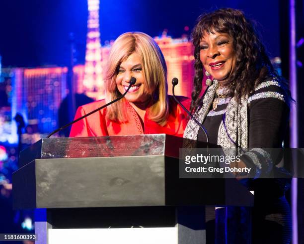 Singer/songwriter Claudette Rogers Robinson and singer Martha Reeves, recipient of the Casino Entertainment Legend Award, speak at the Global Gaming...