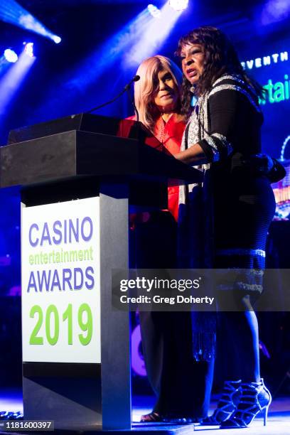 Singer/songwriter Claudette Rogers Robinson and singer Martha Reeves, recipient of the Casino Entertainment Legend Award, speak at the Global Gaming...