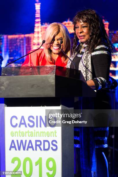 Singer/songwriter Claudette Rogers Robinson and singer Martha Reeves, recipient of the Casino Entertainment Legend Award, speak at the Global Gaming...