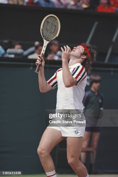 American tennis player John McEnroe during the Wimbledon Championships Men's Singles at the All England Lawn Tennis and Croquet Club, London, UK,...