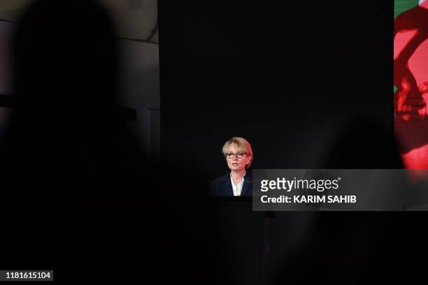 Claude Chirac, late Jacques Chirac's daughter, speaks during a ceremony at the Louvre in Abu Dhabi marking the museum's second anniversary on...