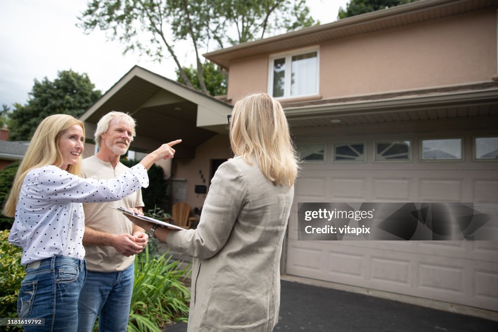 Couple Looking at a New House