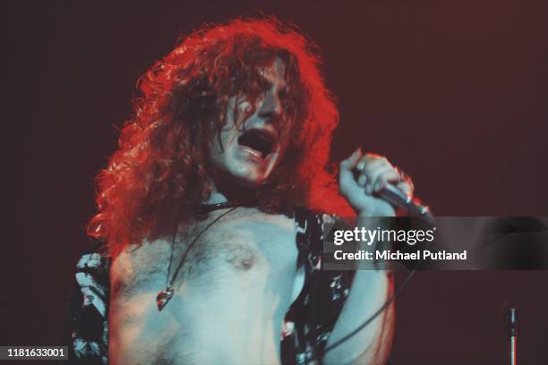 Singer Robert Plant of English rock group Led Zeppelin, performing live on stage at Earls Court Arena in London, May 1975. The band played five...