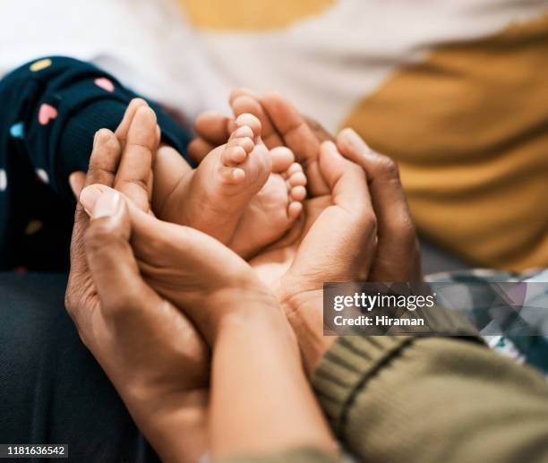 having a baby showed us what love really is - family feet stock pictures, royalty-free photos & images