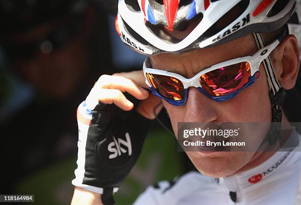 Bradley Wiggins of Great Britain and SKY Procycling prepares for the start of stage three of the 2011 Tour de France from Olonne-sur-Mer to Redon on...