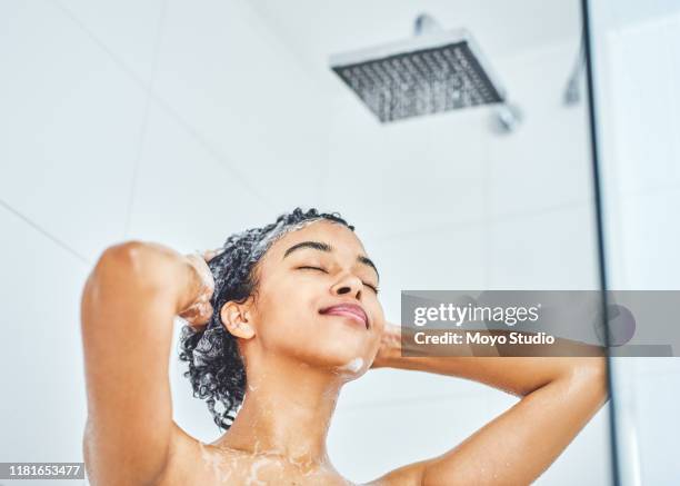 you can't have good hair days without clean, healthy hair - woman shampoo stock pictures, royalty-free photos & images