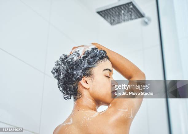 bye bye dandruff - woman shampoo stock pictures, royalty-free photos & images
