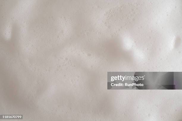 full frame shot of milk foam - milk full frame stock pictures, royalty-free photos & images