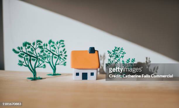 house and trees - rural banking stock-fotos und bilder