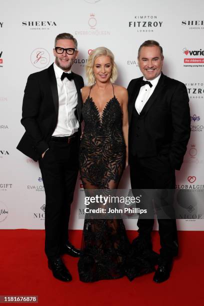 Eddie Boxshall, Denise Van Outen and Nick Ede attend the annual Global Gift Gala London at Kimpton Fitzroy Hotel on October 17, 2019 in London,...